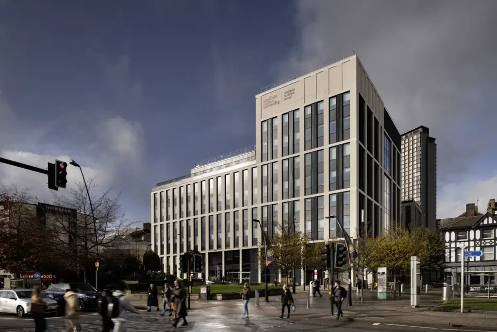 Facade of the Sheffield Business School building at Sheffield Hallam University, featuring a modern design with glass and concrete, part of the Langsett, Redmires and Strines academic architecture project.
