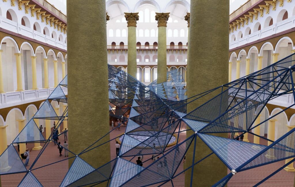 A large blue spaceframe installation titled Lightness of Strength suspended within the National Building Museum&rsquo;s Great Hall, weaving between historic columns.