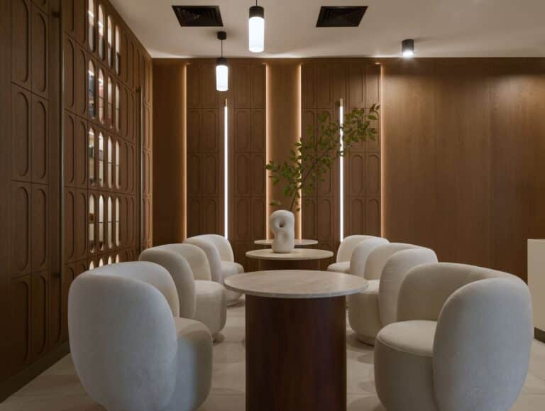 Interior view of Slow Fitness showing a calm, minimalist workout space designed for controlled movement, rest, and sensory balance.