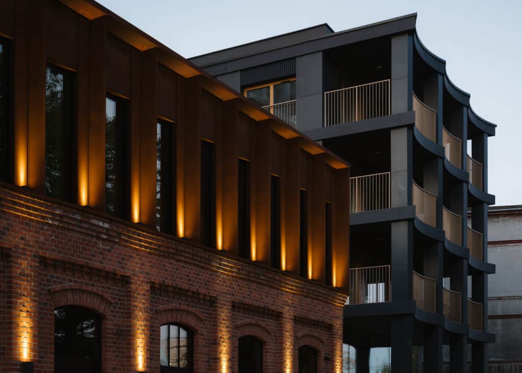 Exterior architectural view of the Nowy Port Bydgoszcz project showing contemporary building fa&ccedil;ades and public space.