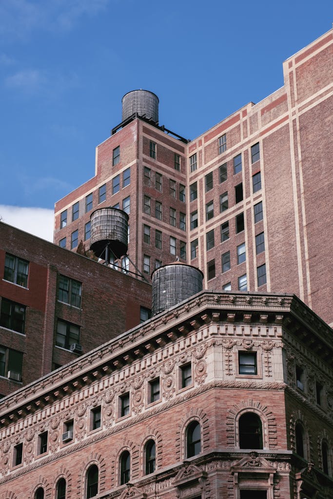 Classic architectural shot of brick buildings with water towers in NYC.