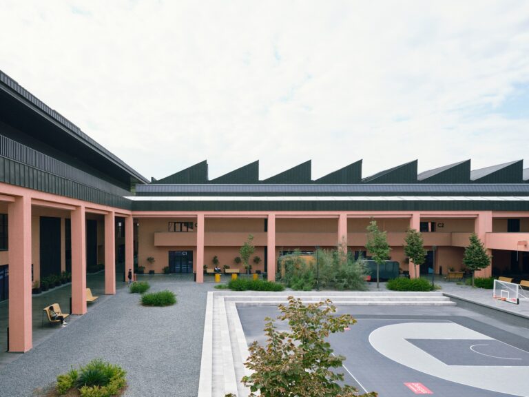 Aerial view of the Basketball Development Center (BDC) integrating historical walls of Istanbul with modern architectural design, showcasing the harmonious blend of heritage and sports facilities.