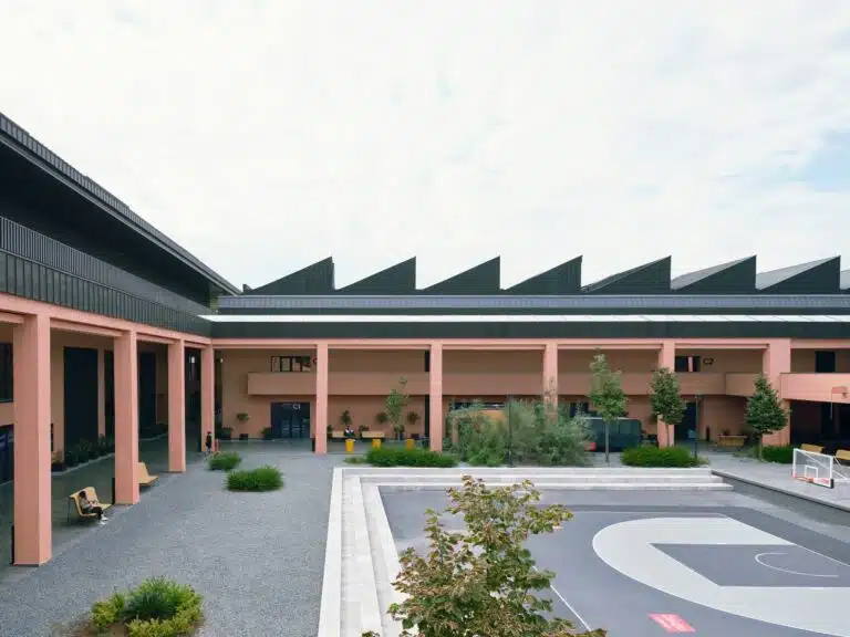 Aerial view of the Basketball Development Center (BDC) integrating historical walls of Istanbul with modern architectural design, showcasing the harmonious blend of heritage and sports facilities.