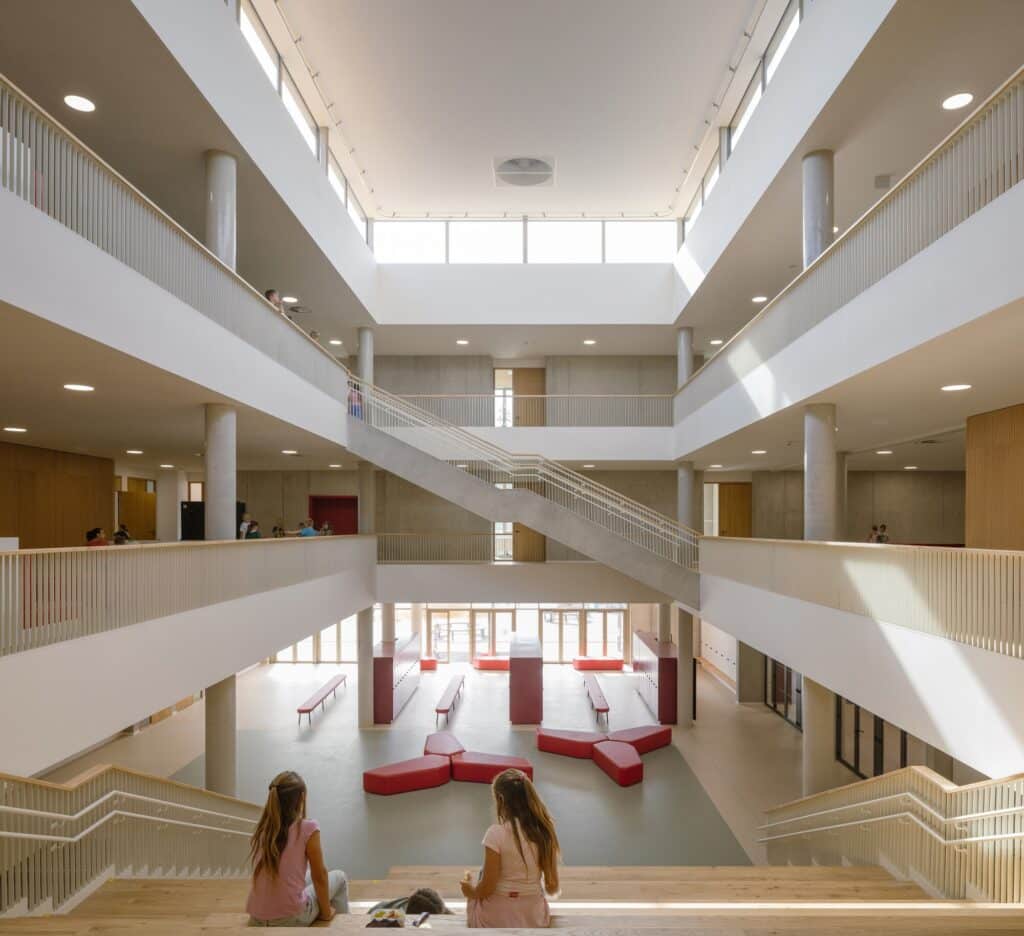 Comprehensive view of Cheneh school project illustrating flexible learning spaces, integrated sports facilities, rooftop classrooms, sustainable design, and interactive educational environments.