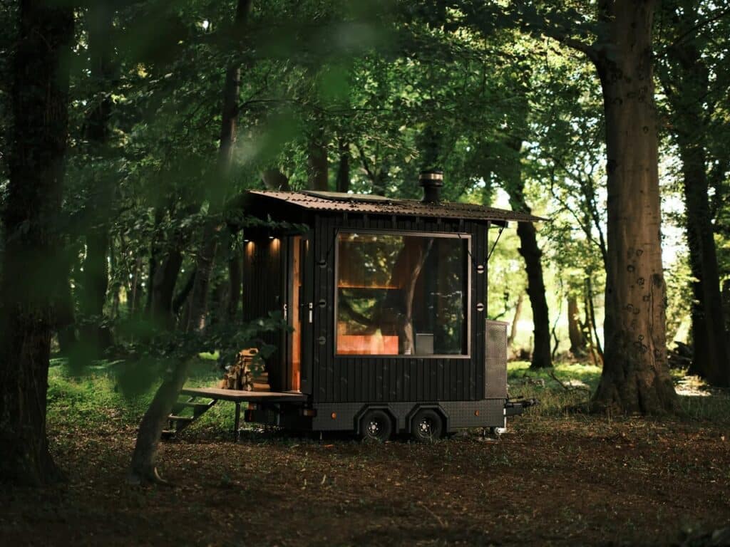 Aquila mobile sauna project showcasing compact Finnish-inspired design, durable materials, solar-powered lighting, and foldable roof for remote locations