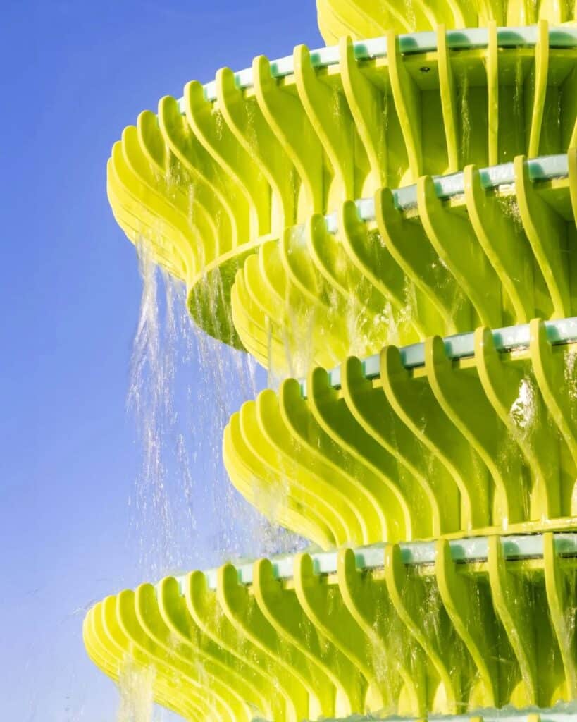 The Fountain in Brent Cross Town, London, is a contemporary and innovative architectural design featuring bright green sculptural panels, unusual angles, and bold colors, combined with frozen water motion to create an interactive visual and sensory experience for visitors, reflecting Neon Studio&rsquo;s philosophy of public art, enhancing local identity and social interaction, while offering a model for redefining fountains in contemporary urban spaces.