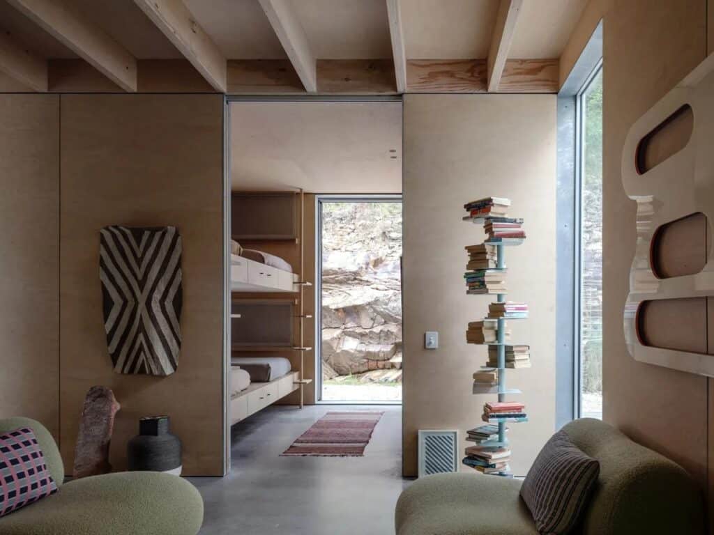 Amongst the Eucalypts holiday home by Jason Gibney Design Workshop in New South Wales, an architectural project demonstrating integration with eucalyptus forests, sustainable building materials, flexible indoor-outdoor spaces, and design strategies for fire-prone landscapes.