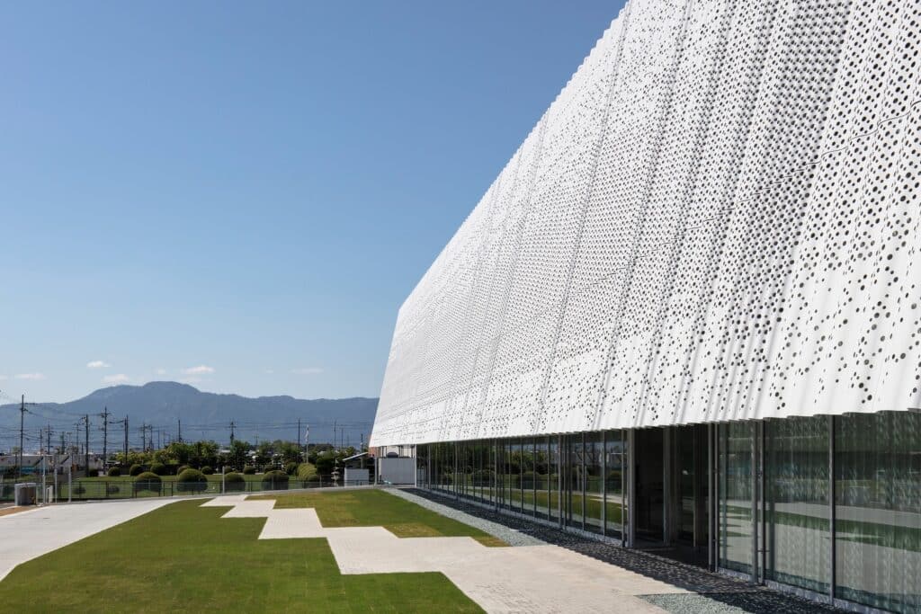 Hair care products factory in Kosatsu, designed to integrate environmental sustainability, YOSHIZU reed screen, water and energy management, with flexible workspaces.