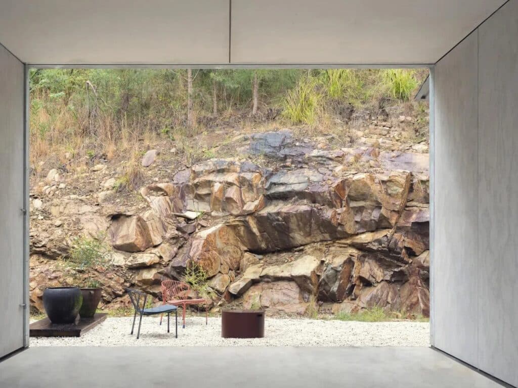 Amongst the Eucalypts holiday home by Jason Gibney Design Workshop in New South Wales, an architectural project demonstrating integration with eucalyptus forests, sustainable building materials, flexible indoor-outdoor spaces, and design strategies for fire-prone landscapes.