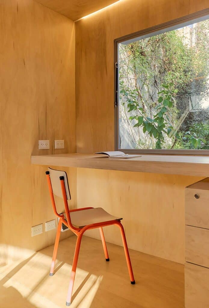 Castillo mobile office in Buenos Aires, a compact and prefabricated architectural design integrating mobility, natural light, ventilation, and custom interior solutions, demonstrating contemporary workspace flexibility.