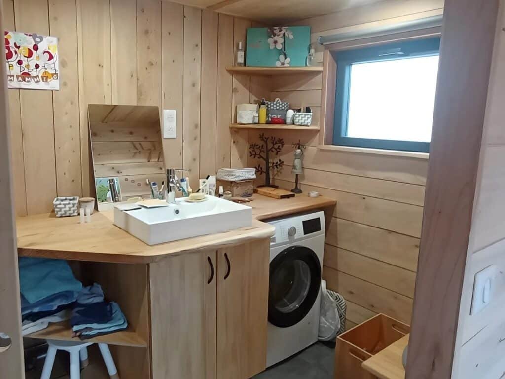 Tiny XXL home upper floors illustrating separate sleeping areas for parents and children to ensure privacy in a small house.