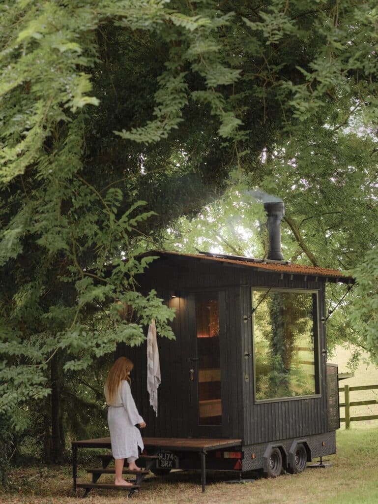 Aquila mobile sauna project showcasing compact Finnish-inspired design, durable materials, solar-powered lighting, and foldable roof for remote locations