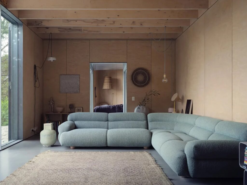 Amongst the Eucalypts holiday home by Jason Gibney Design Workshop in New South Wales, an architectural project demonstrating integration with eucalyptus forests, sustainable building materials, flexible indoor-outdoor spaces, and design strategies for fire-prone landscapes.