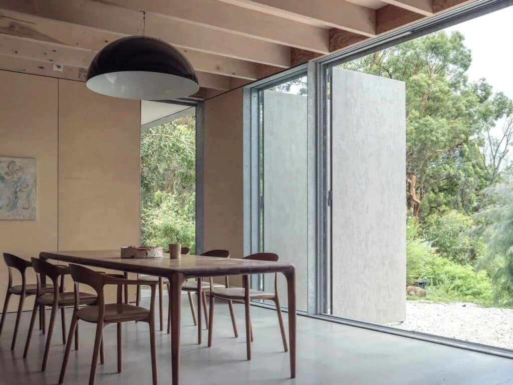 Amongst the Eucalypts holiday home by Jason Gibney Design Workshop in New South Wales, an architectural project demonstrating integration with eucalyptus forests, sustainable building materials, flexible indoor-outdoor spaces, and design strategies for fire-prone landscapes.