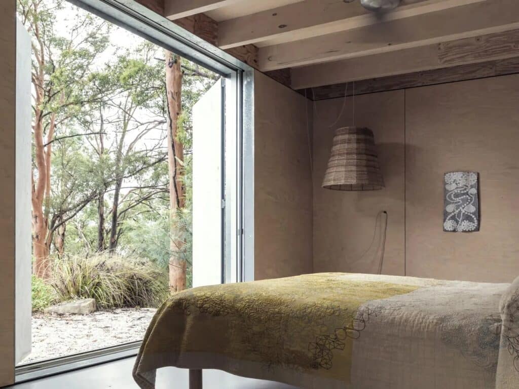 Amongst the Eucalypts holiday home by Jason Gibney Design Workshop in New South Wales, an architectural project demonstrating integration with eucalyptus forests, sustainable building materials, flexible indoor-outdoor spaces, and design strategies for fire-prone landscapes.