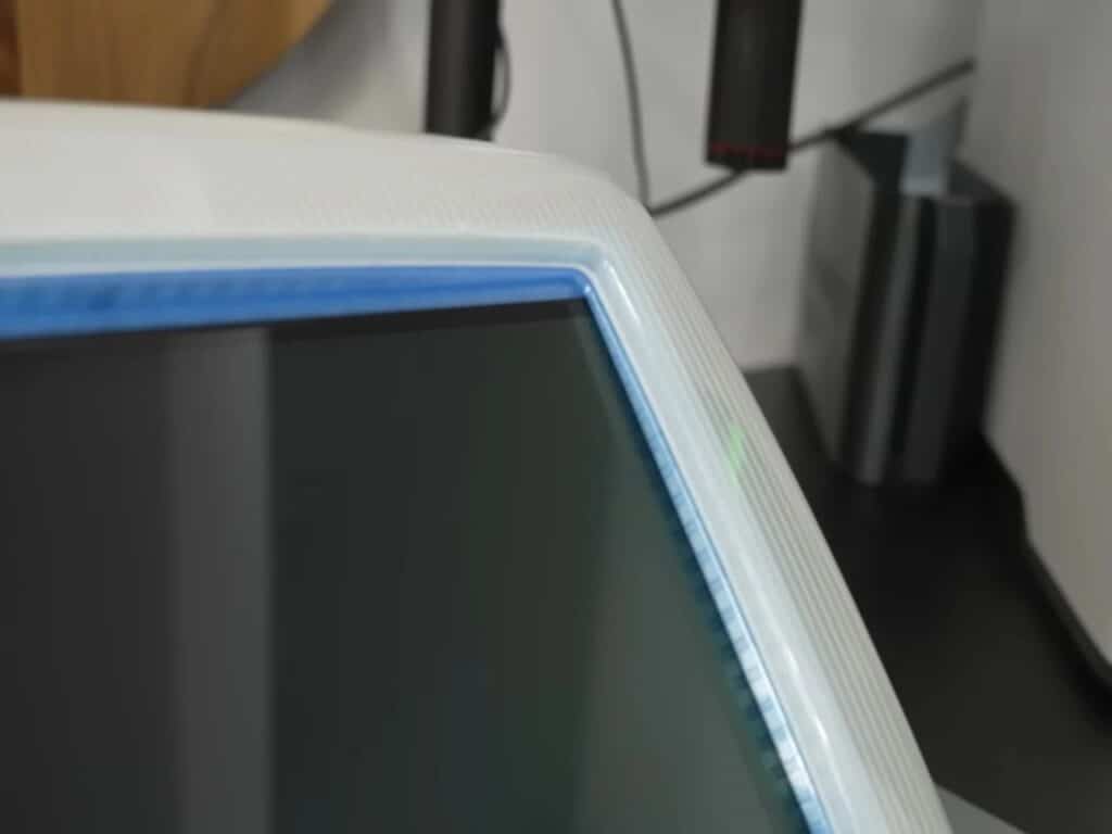 Refurbished Apple iMac G3 featuring original translucent design with modern Mac Mini integration, 4K OLED display, upgraded storage, and enhanced audio system, blending 1990s aesthetics with contemporary performance.