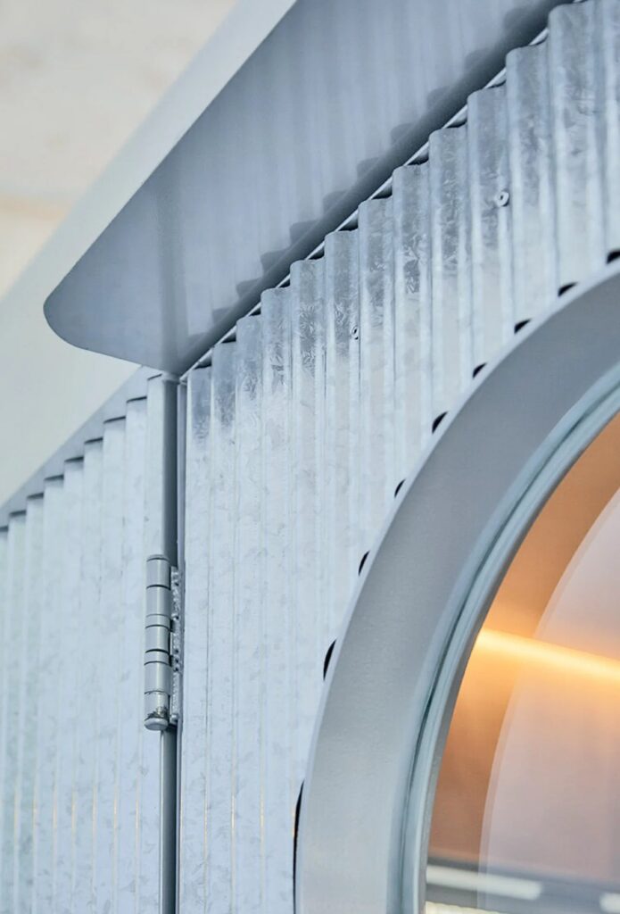 Castillo mobile office in Buenos Aires, a compact and prefabricated architectural design integrating mobility, natural light, ventilation, and custom interior solutions, demonstrating contemporary workspace flexibility.