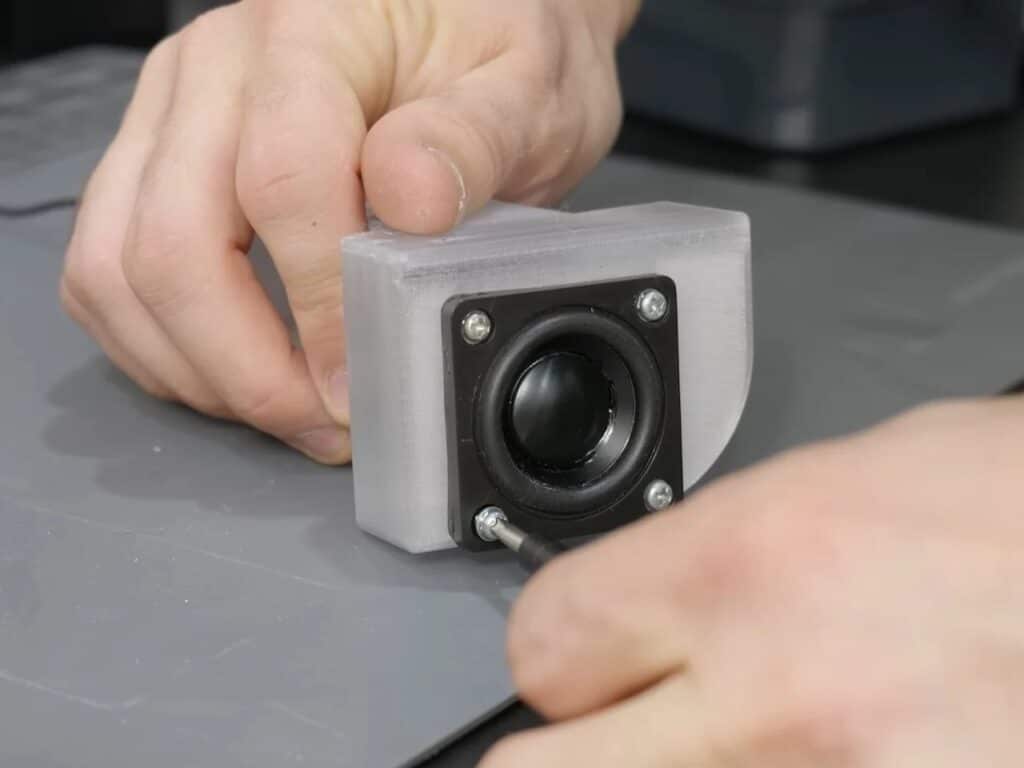 Refurbished Apple iMac G3 featuring original translucent design with modern Mac Mini integration, 4K OLED display, upgraded storage, and enhanced audio system, blending 1990s aesthetics with contemporary performance.