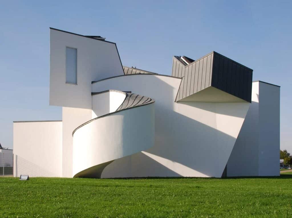 Frank Gehry&rsquo;s iconic architectural masterpieces including Guggenheim Museum Bilbao, Walt Disney Concert Hall, Dancing House Prague, Louis Vuitton Foundation Paris, and 8 Spruce Street New York, showcasing innovative designs, flowing forms, dynamic facades, and the transformative impact of contemporary architecture on urban landscapes.