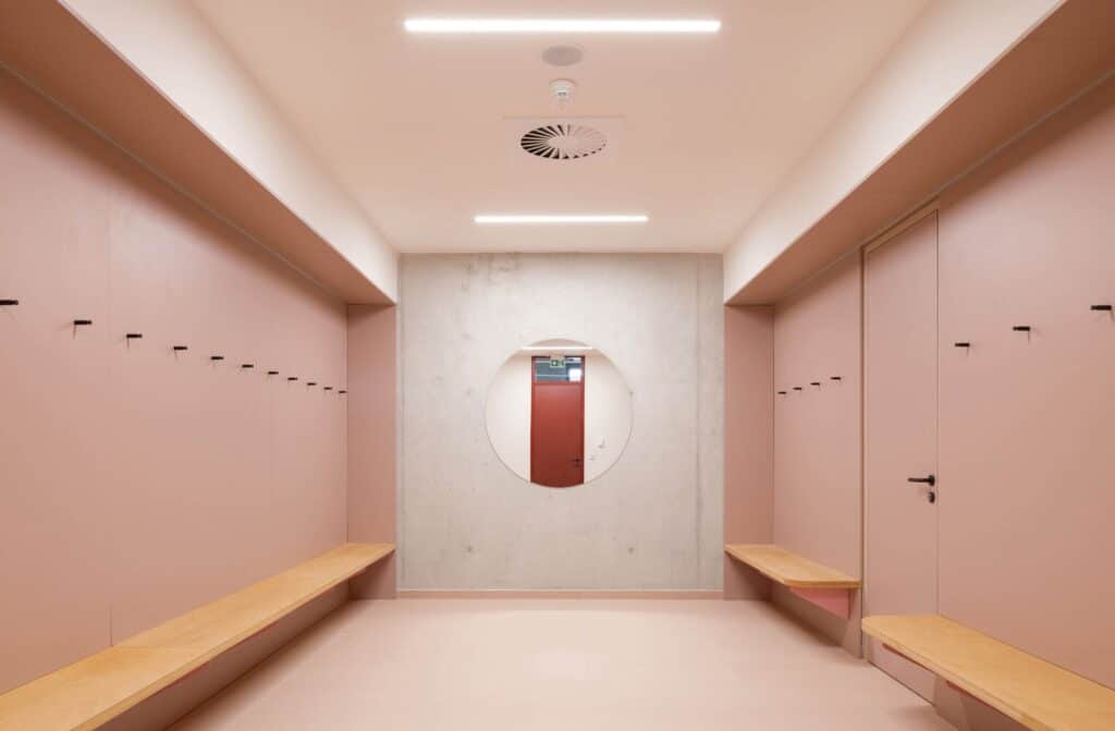 Comprehensive view of Cheneh school project illustrating flexible learning spaces, integrated sports facilities, rooftop classrooms, sustainable design, and interactive educational environments.