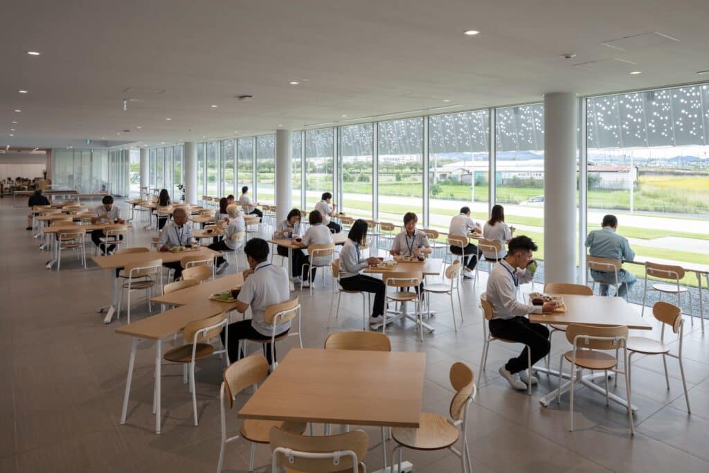 Hair care products factory in Kosatsu, designed to integrate environmental sustainability, YOSHIZU reed screen, water and energy management, with flexible workspaces.