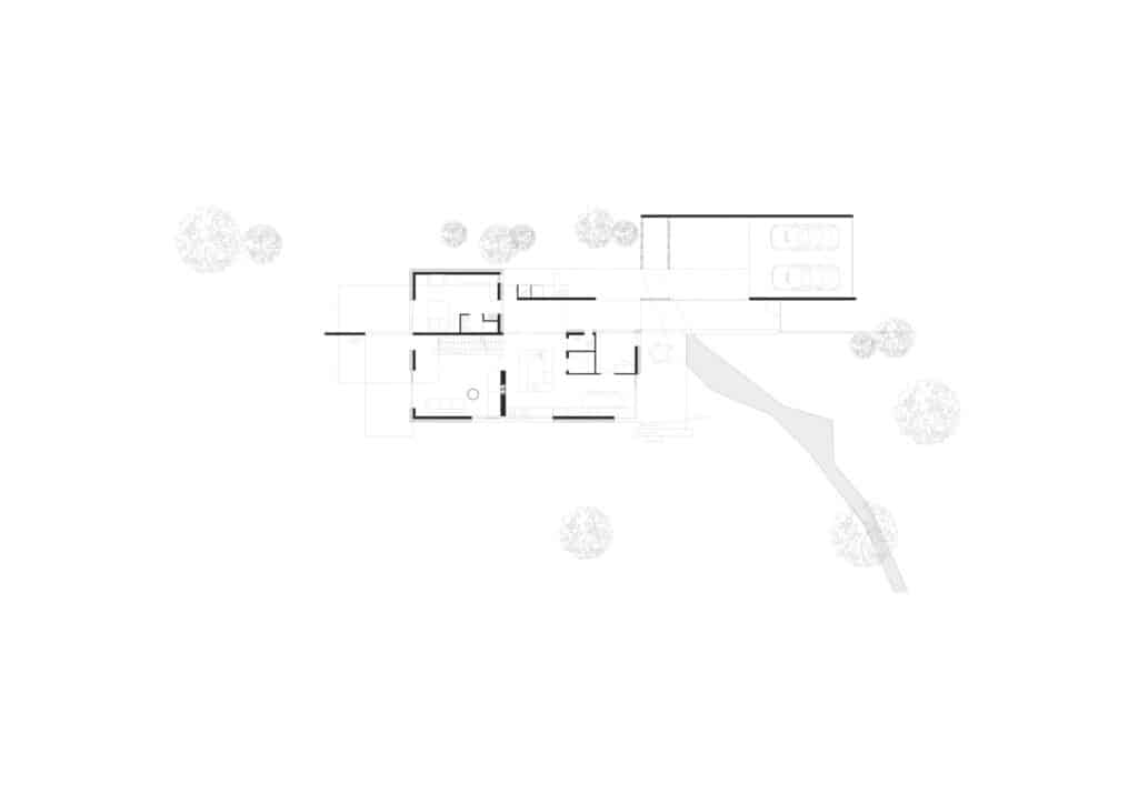 Architectural floor plan of House Am Feuerbachl showing the layout of the ground floor and surrounding site.