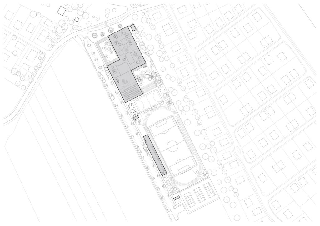 Private courtyard and sports facilities at Cheneh school, separating recreational and educational activities.