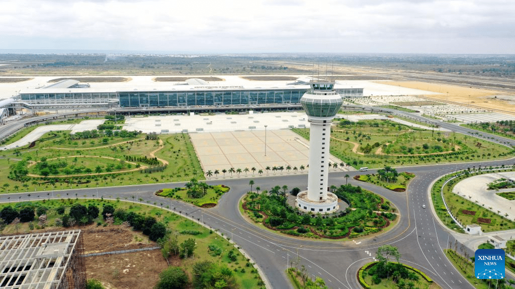 Aerial rendering of the Icolo e Bengo Aerotropolis Masterplan by Foster + Partners, showing the airport runways and the three distinct development districts.