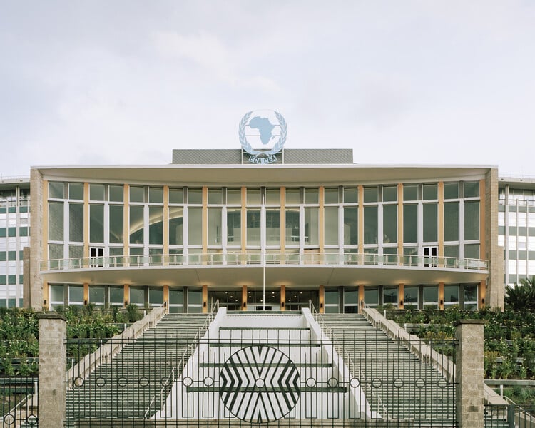 The main entrance of the restored UN Africa Hall in Addis Ababa, showcasing its modernist facade and the grand staircase, a key project in the Africa Hall restoration.