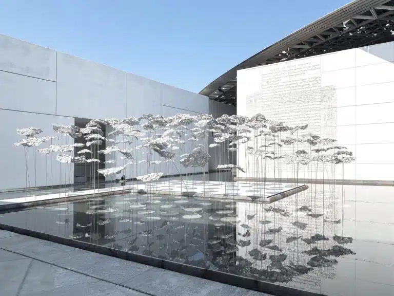The 'Choreography of a Cloud' temporary pavilion by YOKOMAE et BOUAYAD under the Louvre Abu Dhabi dome.