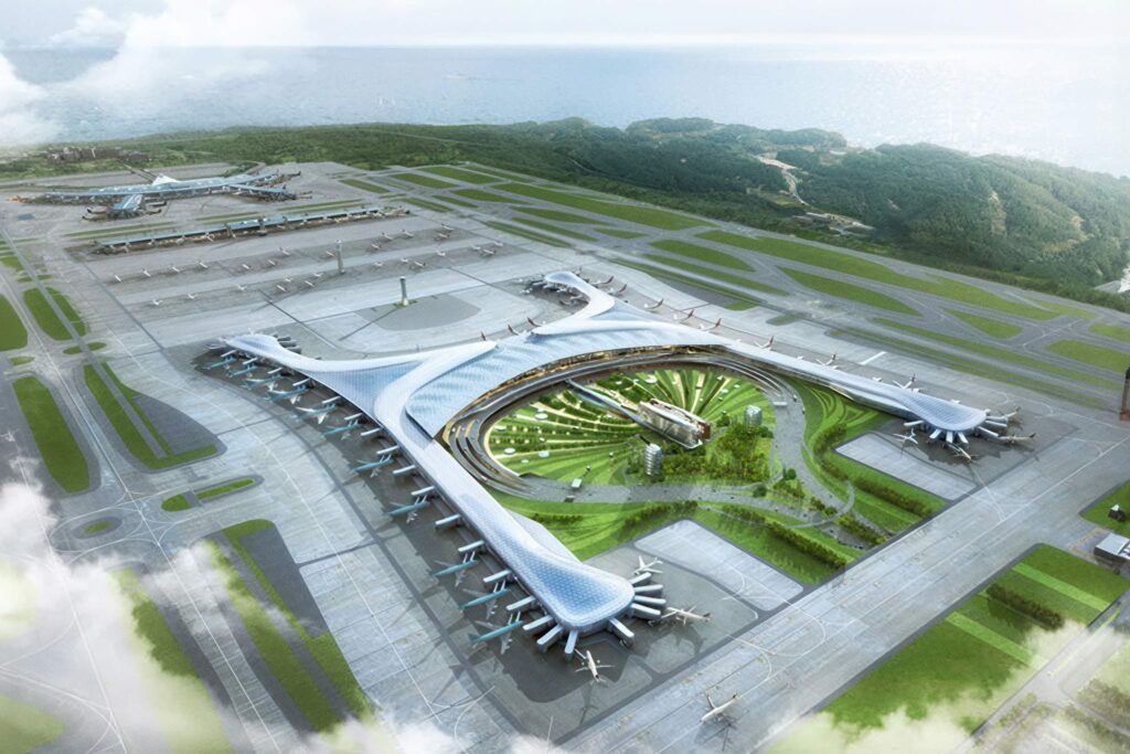 Aerial daytime rendering of Bishoftu International Airport under construction in Ethiopia, showing four runways, a central terminal core with curved steel roof, satellite finger piers, and landscaped entrance plazas.