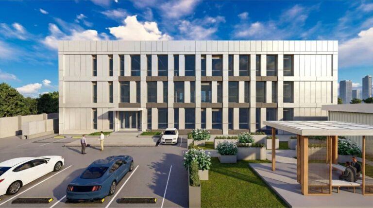 Rendering of the Yaoundé modular office building in Cameroon, showcasing its modern facade with vertical paneling and integrated green spaces under a clear sky.