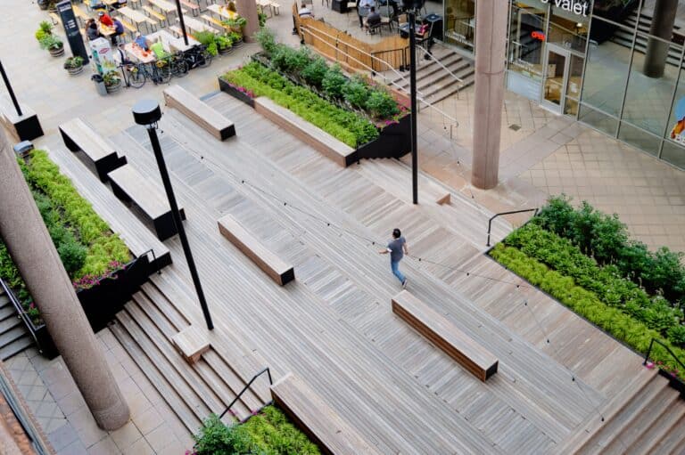 Aerial view of a public urban space showing circulation patterns and shared pedestrian areas in public spaces architectural design