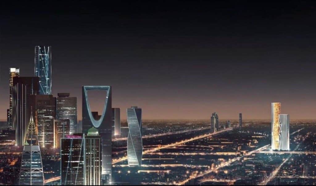 منظر جوي ليلي لناطحتي شمال الرياض مدمجتين في خط أفق المدينة المضاء، وموقعهما شرق مركز الملك عبدالله المالي.