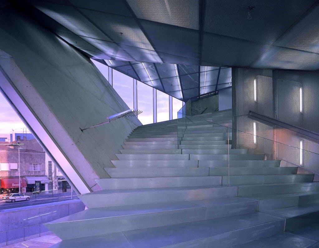 The main auditorium of the Casa da Musica, showing the corrugated glass wall and distinctive plywood panels.