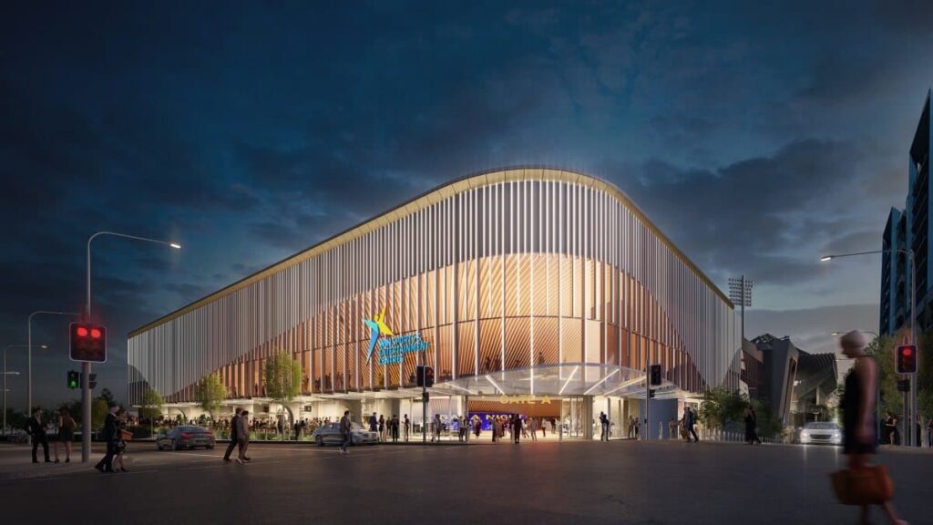 منظر خارجي للمدخل الرئيسي لساحة وين الجديدة في مجمع ولونجونج الرياضي، يظهر الواجهة والساحة العامة.