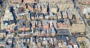 Suburban housing grid pattern reflecting systemic architecture and car-dependent planning