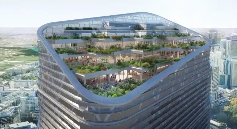 Aerial rendering of a hybrid timber tower&rsquo;s upper levels, showcasing terraced green spaces and open-air walkways integrated into the building&rsquo;s curved glass facade.