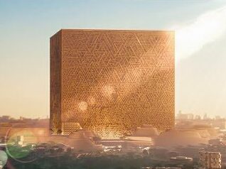 تصميم من منظور جوي يبرز النقاء الهندسي لمشروع المكعب وعلاقته بالمخطط الرئيسي للمربع الجديد المحيط به.