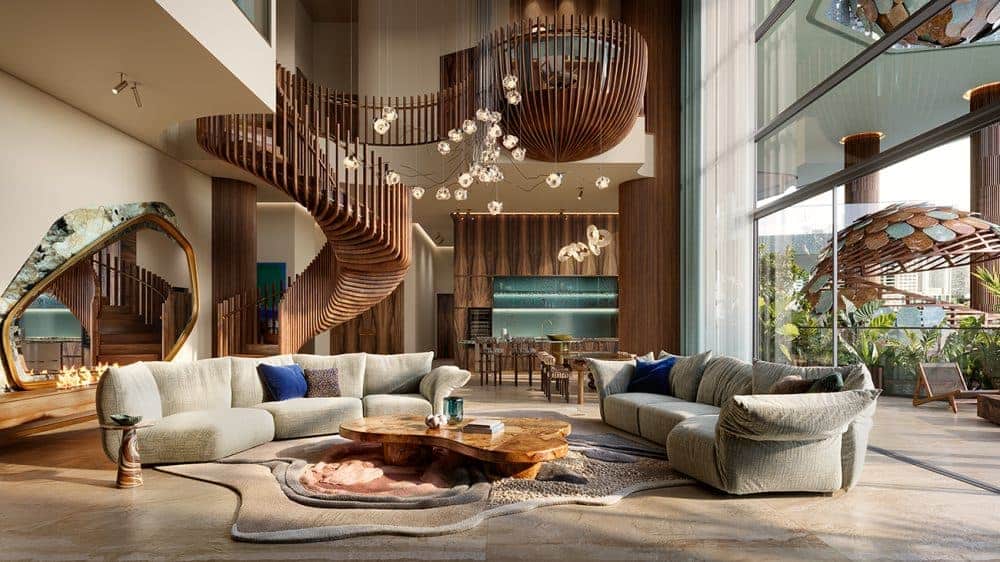 داخلية فاخرة في إيوا واي أوف ووتر مع سلم خشبي منحوت، وأثاث عضوي، ونوافذ تصل من الأرض إلى السقف تطلّ على دبي ووتر كانال.