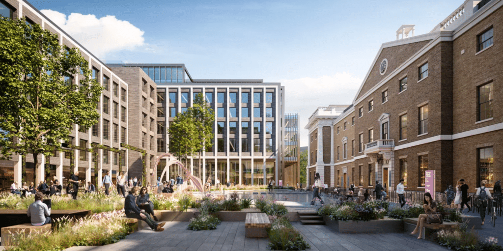 A vibrant public courtyard in the Royal Mint Court redevelopment, filled with people, greenery, and modern seating areas