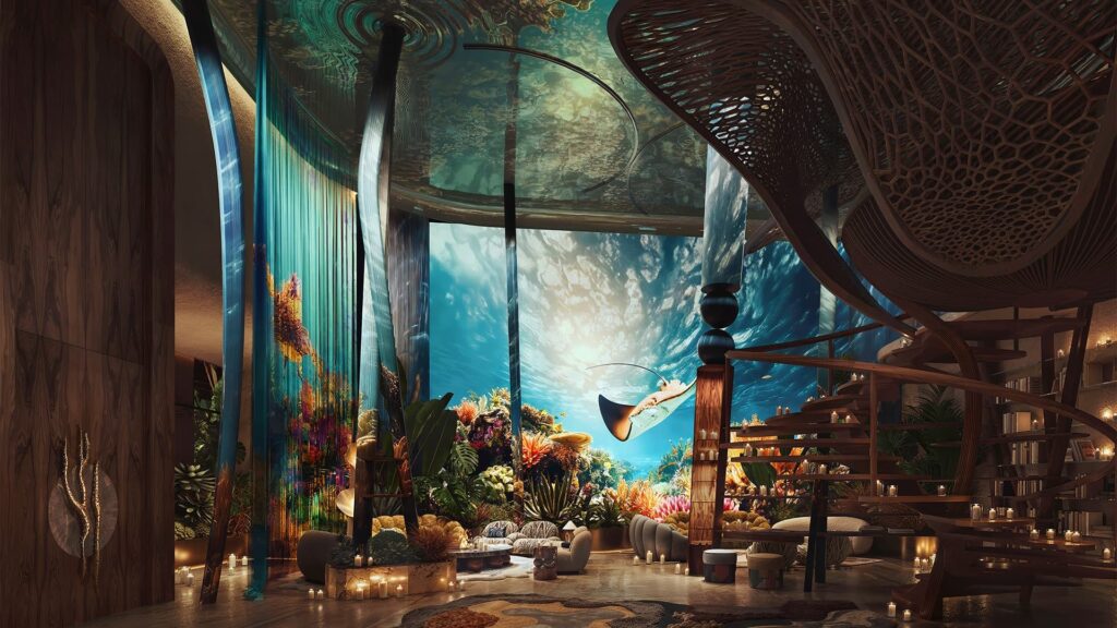داخلية إيوا واي أوف ووتر بتصميم تحت الماء، مع سلم منحوت، ديكور مستوحى من المرجان، وجداريات بحرية بانورامية تعزز تجربة الفراغ.
