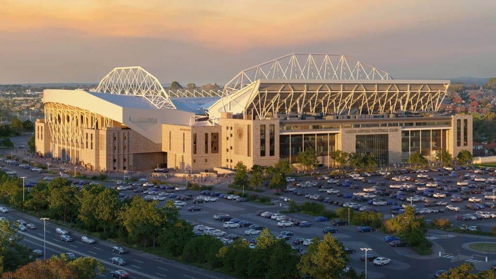 rendering showing the stadium&rsquo;s updated facade and roof structure at sunset, with surrounding parking and residential areas visible.