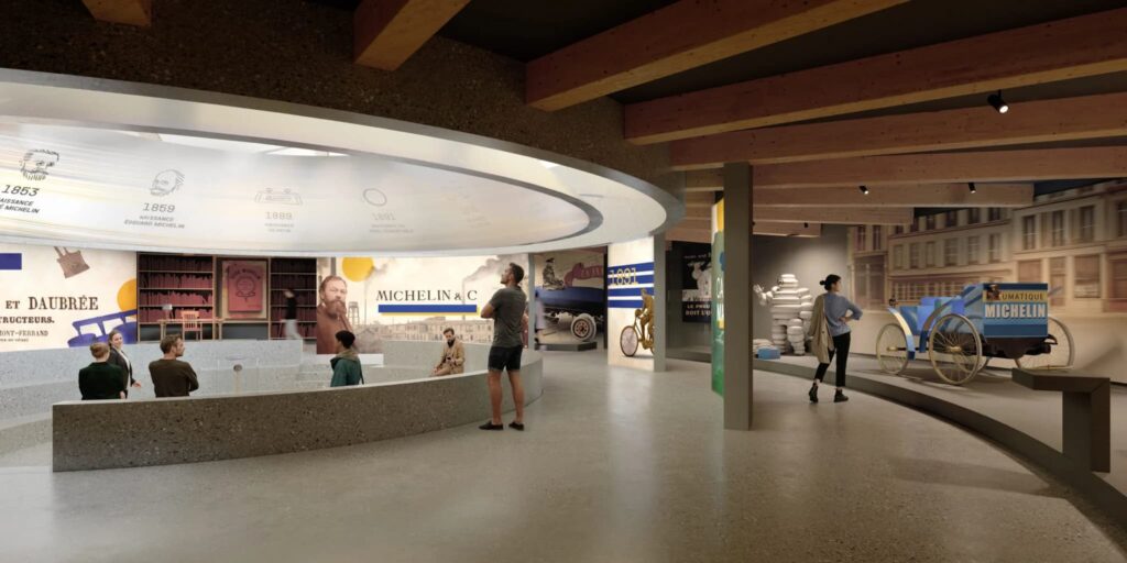 Interior rendering of the historical timeline gallery in Clermont-Ferrand, featuring curved concrete and timber exhibition walls displaying archival imagery, portraits, and early pneumatic vehicle models under exposed wooden ceiling beams.