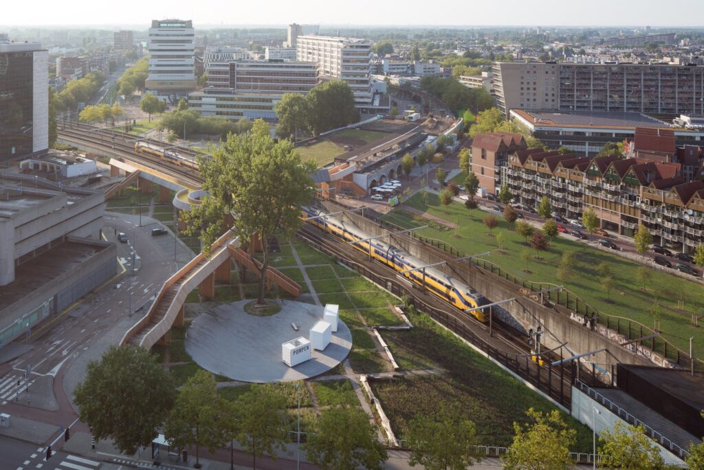 Large-scale public plaza structured by circulation paths and zoning logic
