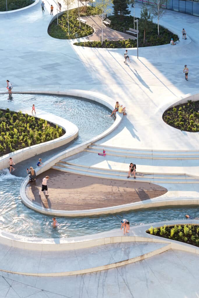 Interactive public space where water features influence social behavior and movement