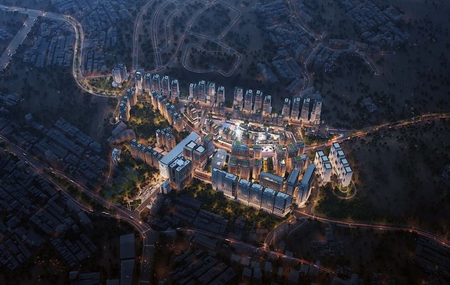 Nighttime aerial rendering of a mixed-use development in Makkah, showcasing architectural security through illuminated pedestrian zones and structured building clusters.