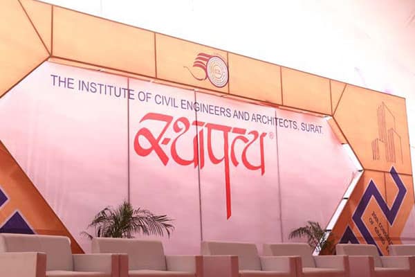 Promotional banner for STHAPATYA Exhibition SURAT 2026 showing event title and visual elements representing architecture, construction, and building industry themes.