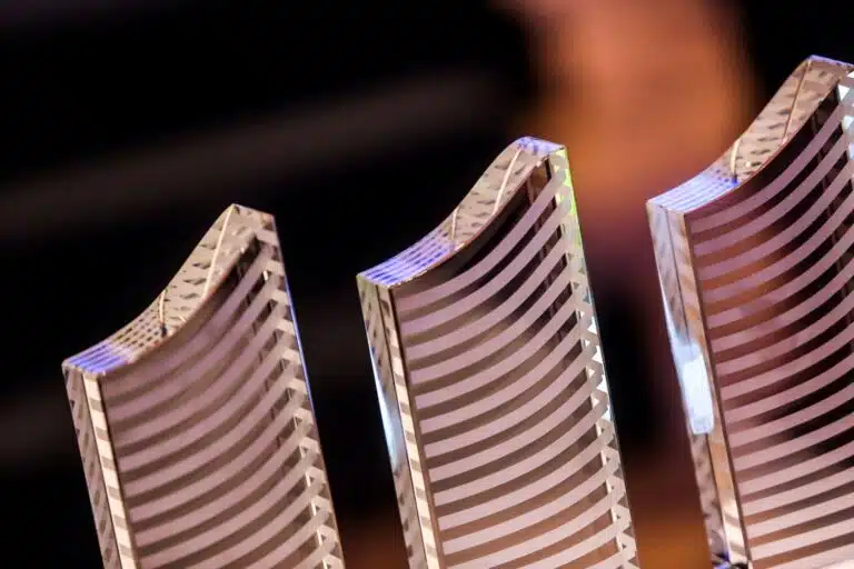 Photograph of the Council on Vertical Urbanism Awards Program 2026 trophy displayed on a reflective surface, illustrating the award’s formal recognition object.