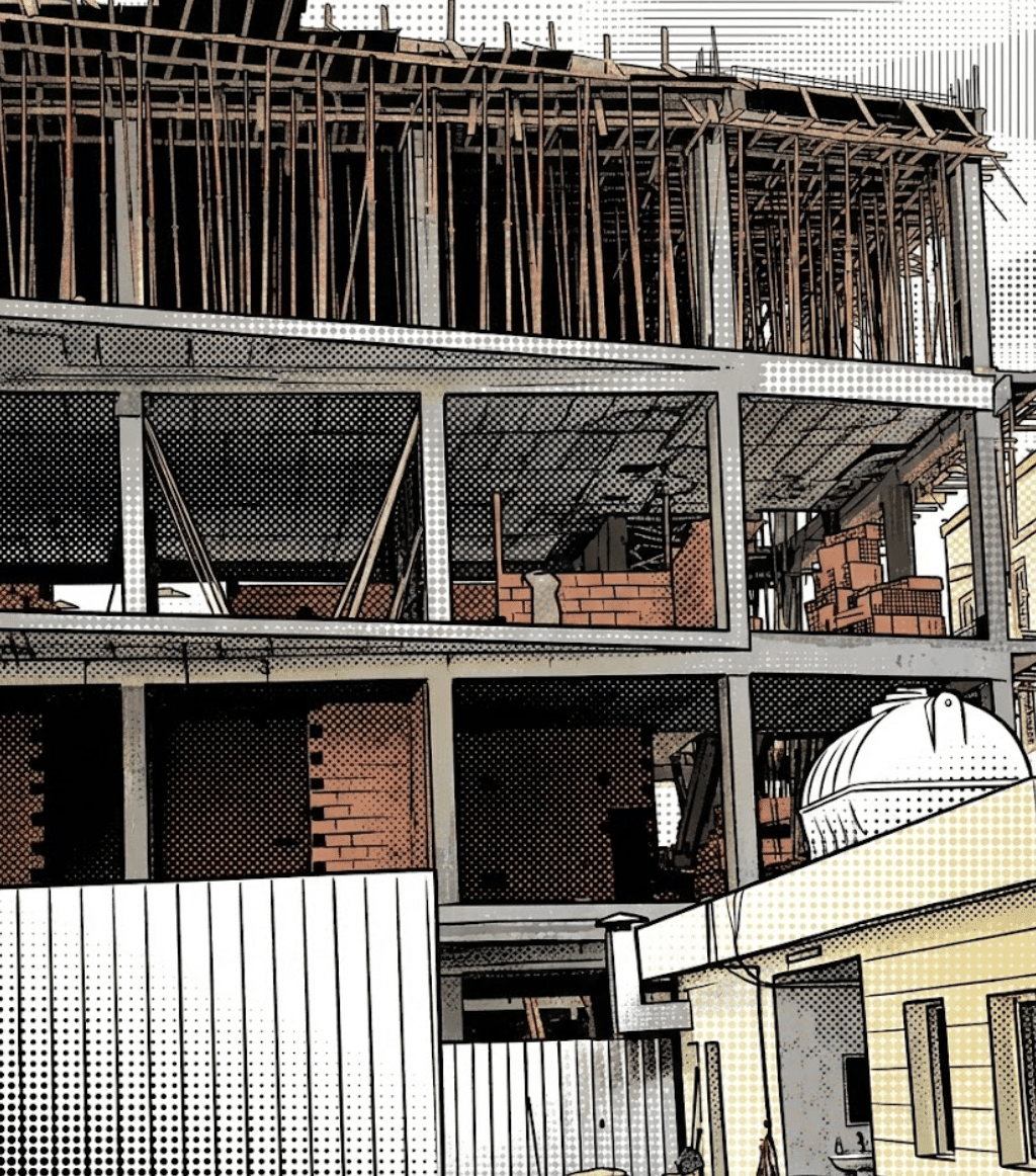 Exterior view of a multi-story building under construction, featuring a reinforced concrete frame, red hollow brick infill walls, and wooden formwork supporting the upper level.